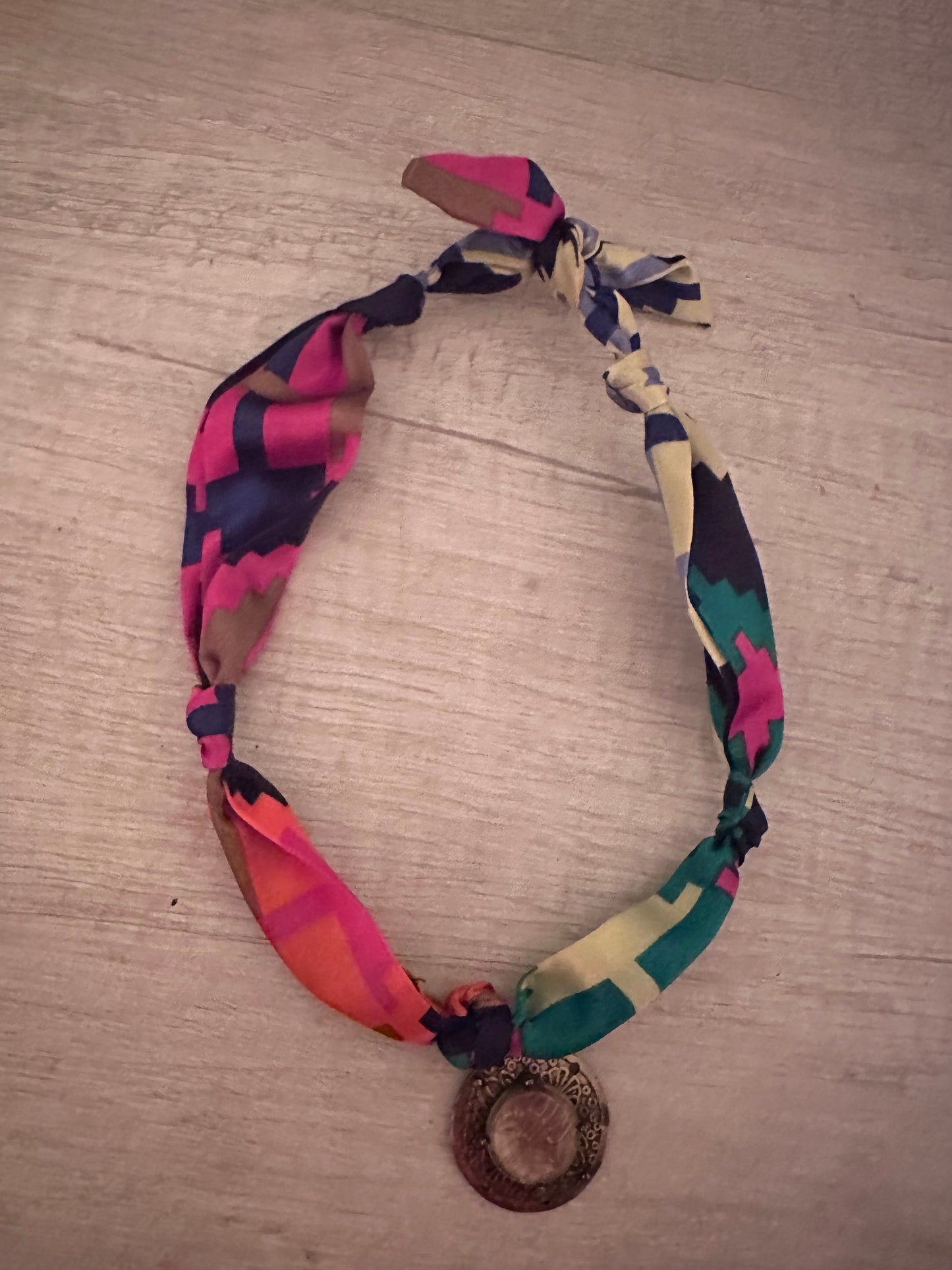 colors of the rainbow medallion