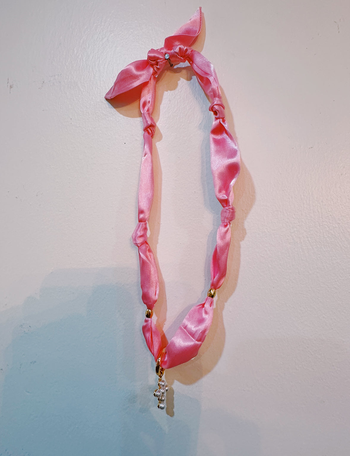 Pinkie Cross Charm Knot