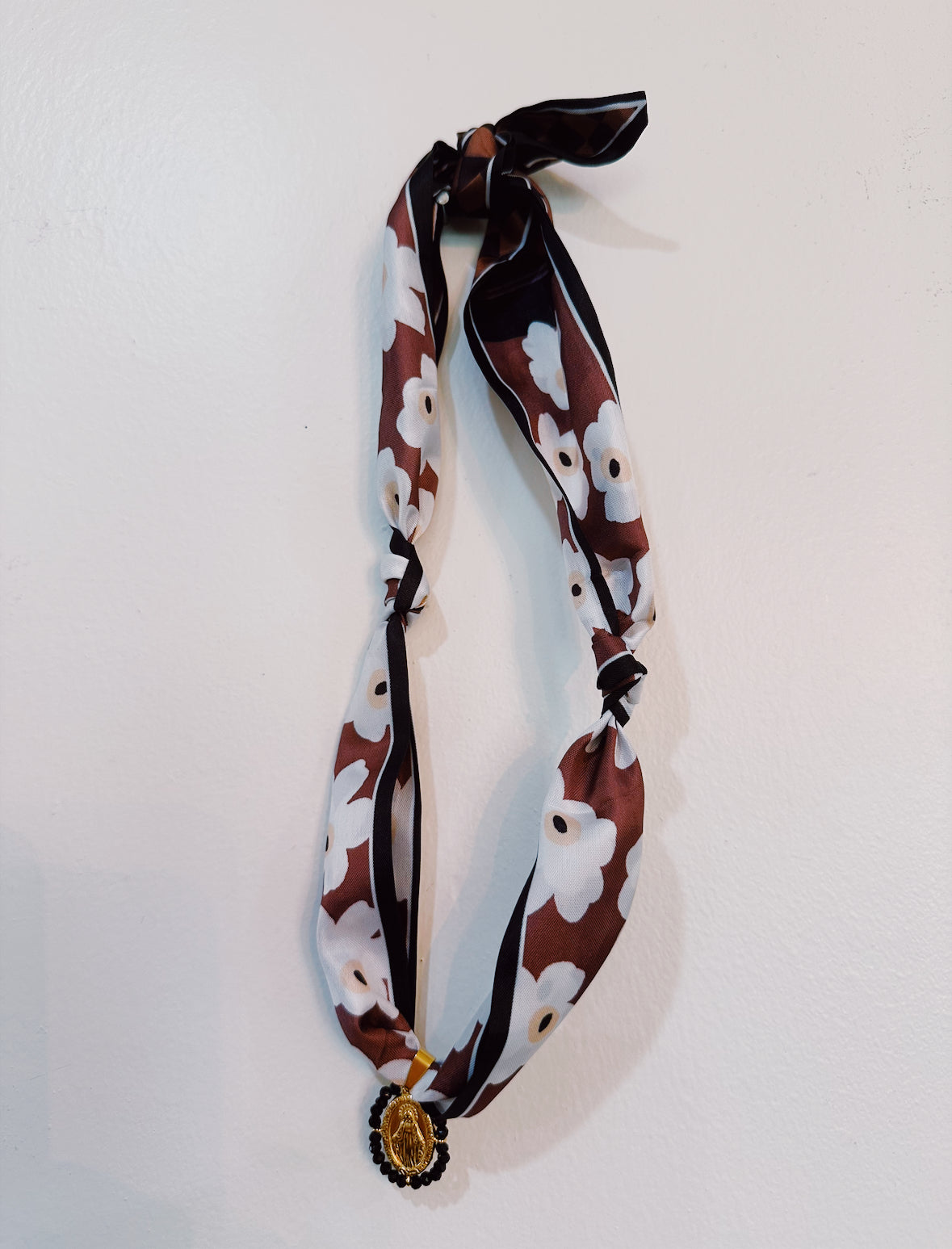 brown & white with onyx Mary