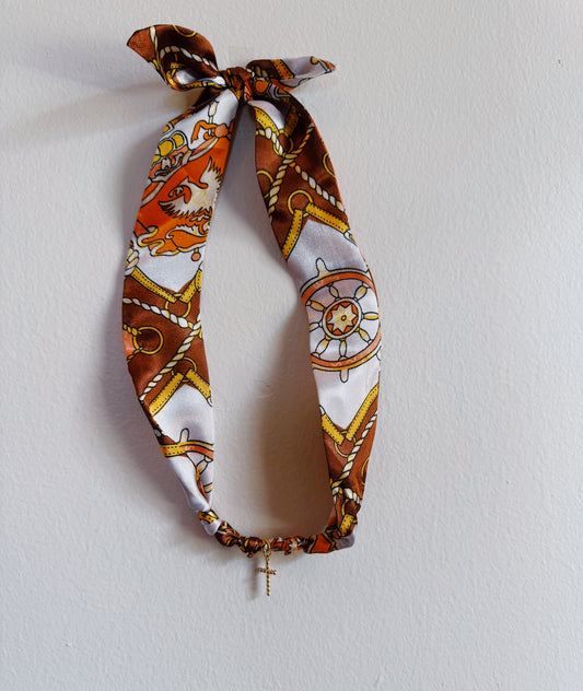 Crossing Orange Charm Knot