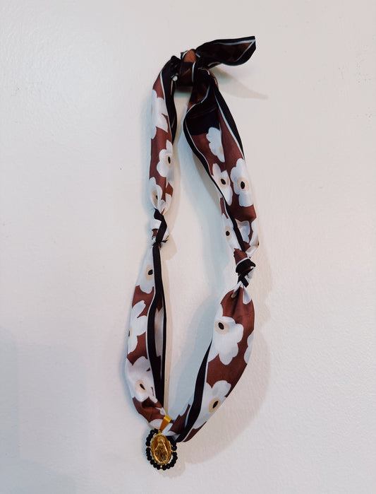 brown & white with onyx Mary